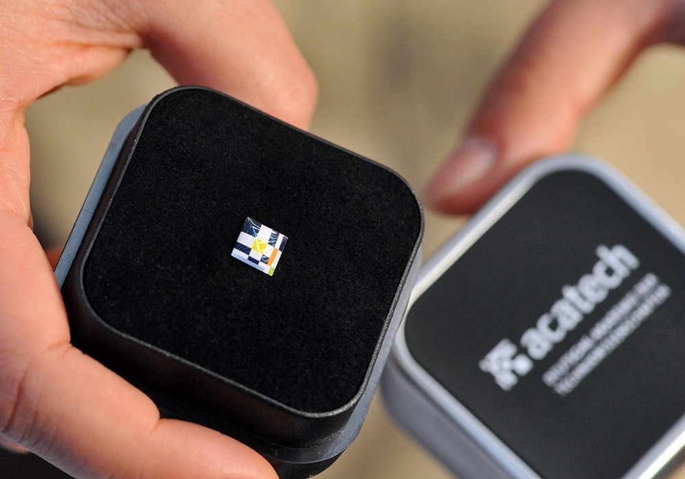 acatech member’s badge in a black box with acatech branding