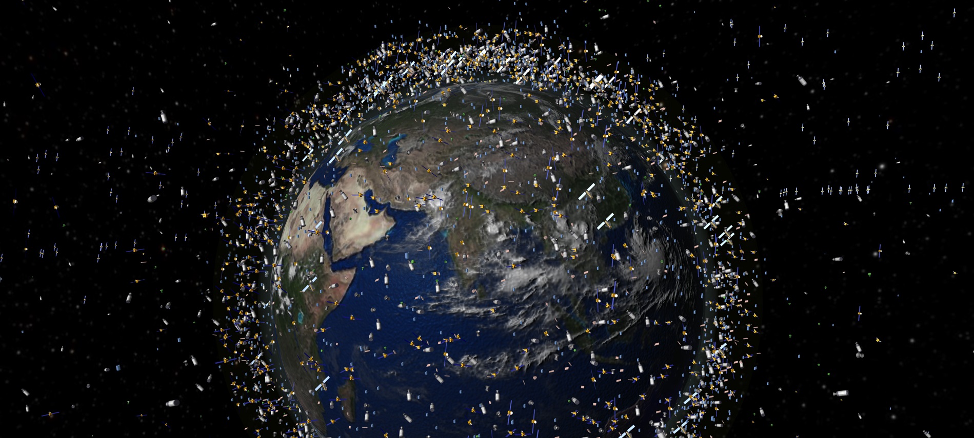 Artistic depiction of space debris orbiting the earth. The size of the debris is exaggerated in comparison to the earth.